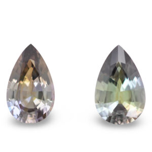 Pair of pear-shaped grey-green loose gemstones
