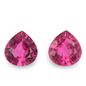 Pair of pear-shaped magenta loose gemstones