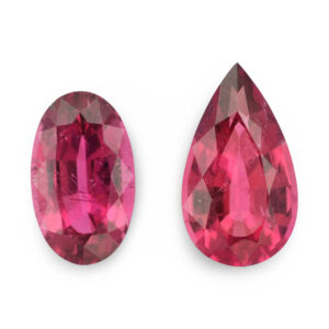 Oval and pear-shaped pink-red loose gemstones