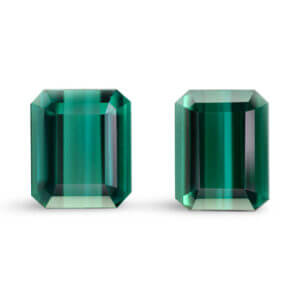Pair of emerald-cut teal loose gemstones