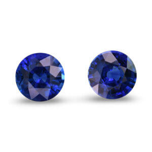 Pair of round blue loose gemstones